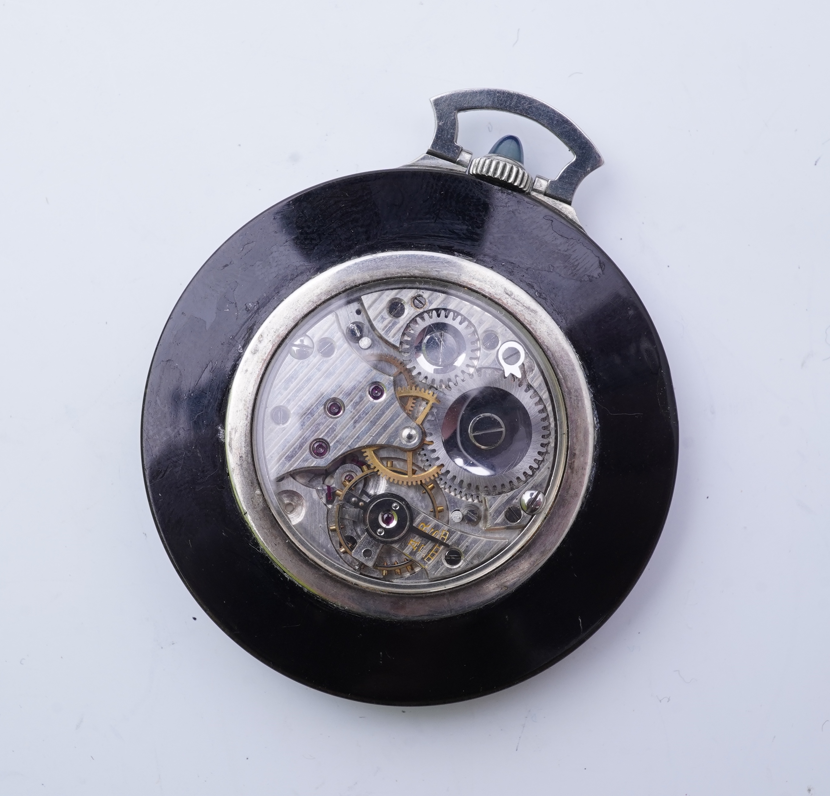 Lacloche Frères, an Art Deco onyx and sapphire pocket watch, circa 1925